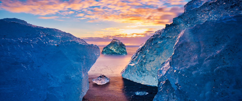 Icebergs on the black sand beach called Diamond Beach.